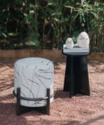 Abstract Marble-Print Pouf with Architectural Wood Cradle - Image 4